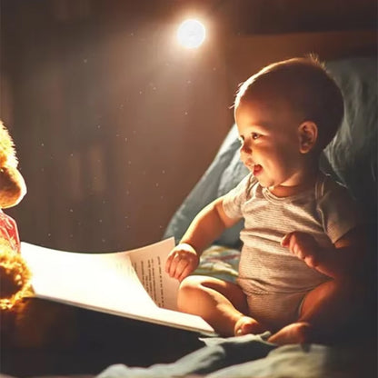 PIR night light glowing softly above a baby sitting up reading a book at bedtime.